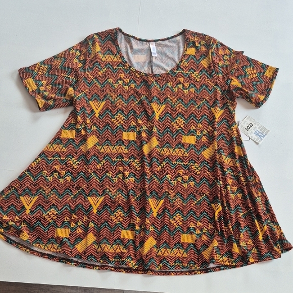 LuLaRoe Tops - Vibrant And Bold Lularoe Perfect T